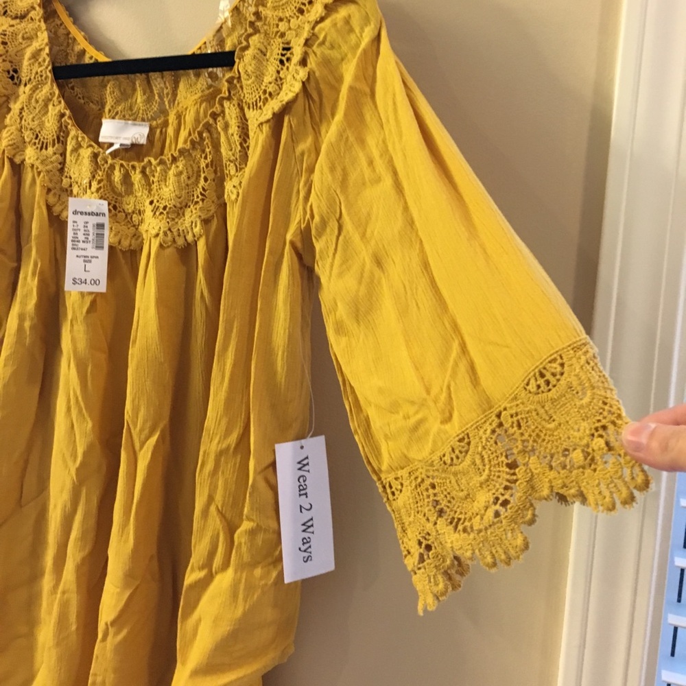 Dress barn off the shoulder bell sleeve top.
